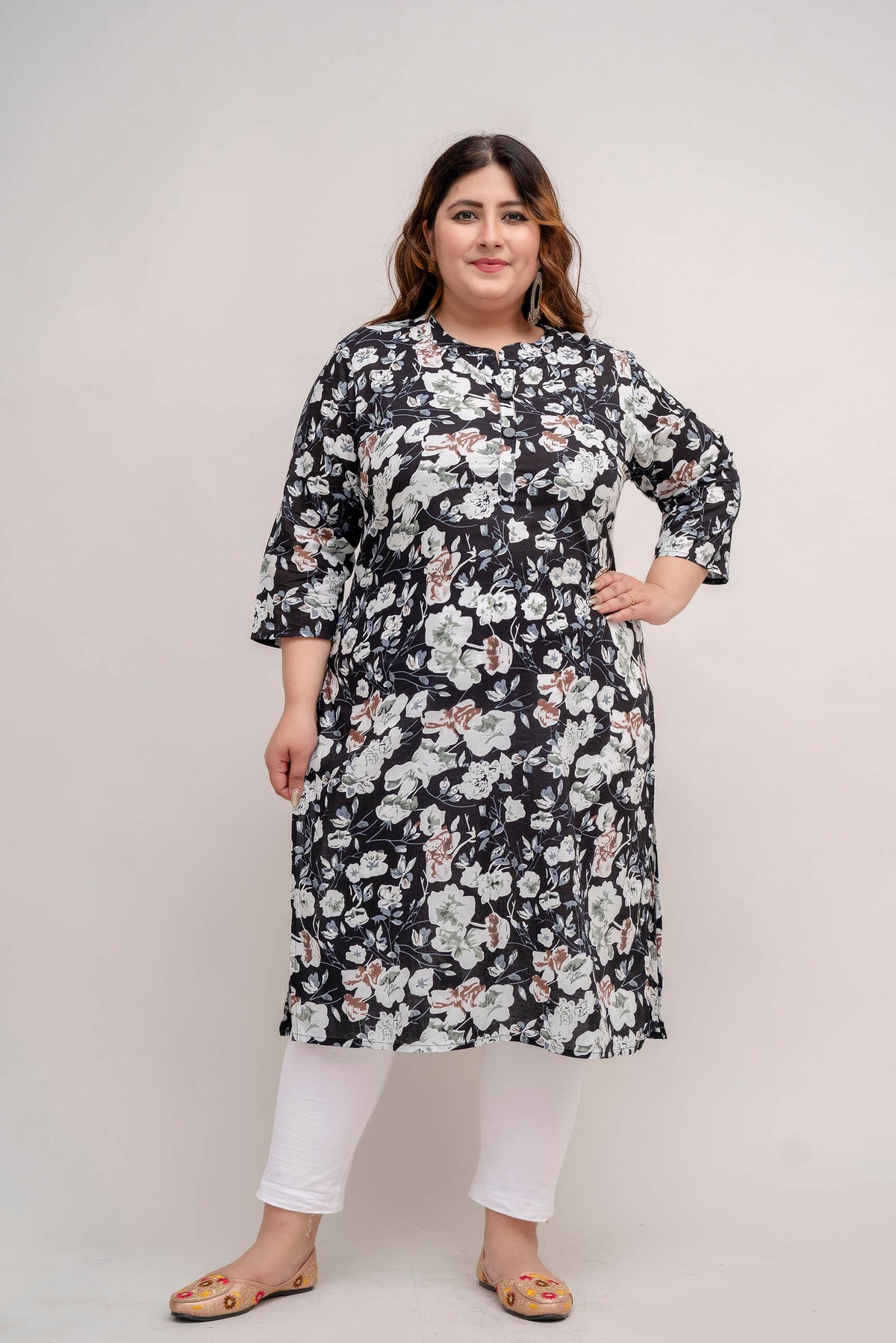 Walking shot of Plus Size floral cotton kurti on black base, office to casual look, fat-friendly drape, sizes 3XL–9XL