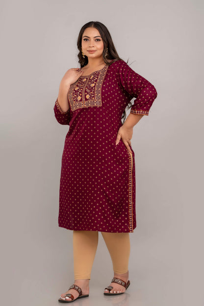 Angled full-length view of maroon rayon embroidered kurti with side slits, curvy women clothing