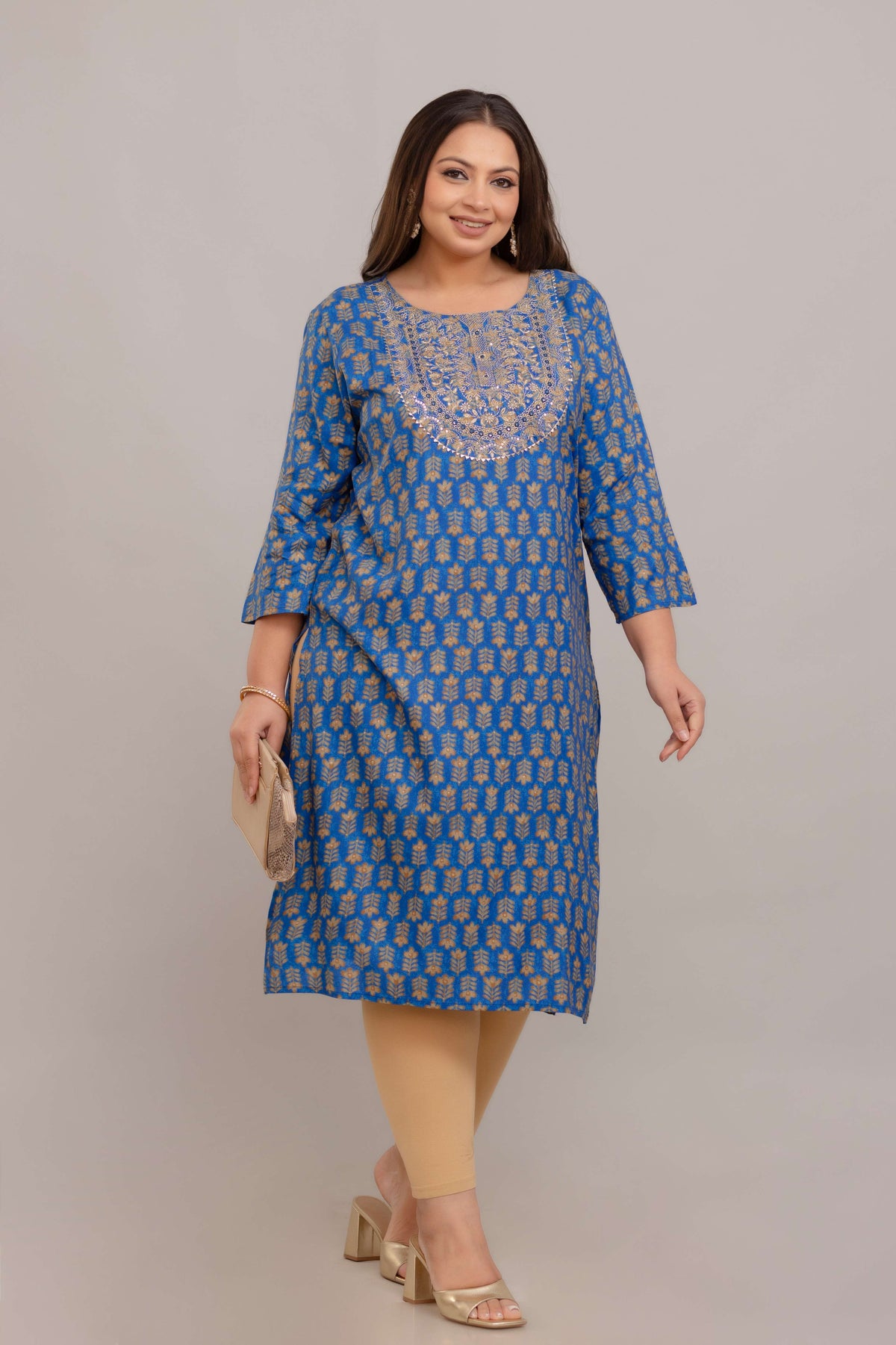 Blue rayon embroidered kurti styled with clutch; elegant big size festive kurti by Curvisha