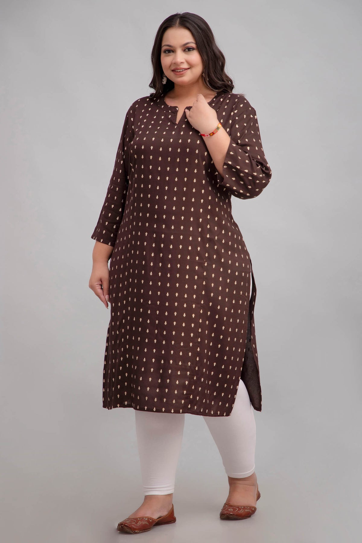Side view showing relaxed fit and side slit; rayon brown printed kurti for curvy/fat-friendly shapes