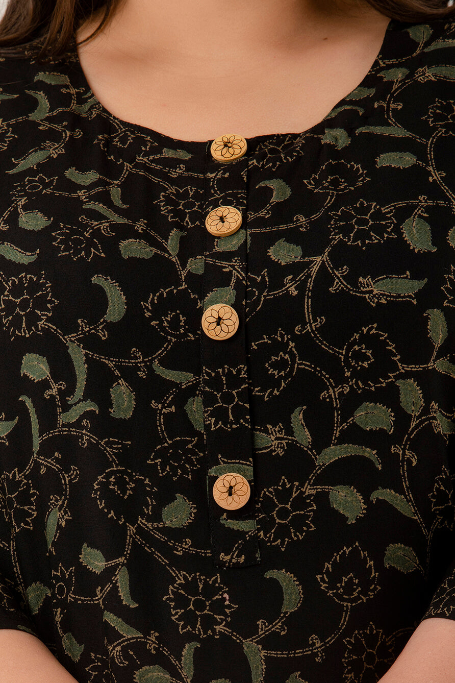 Close-up of round neckline and wooden buttons on black rayon discharge-print kurti for curvy women