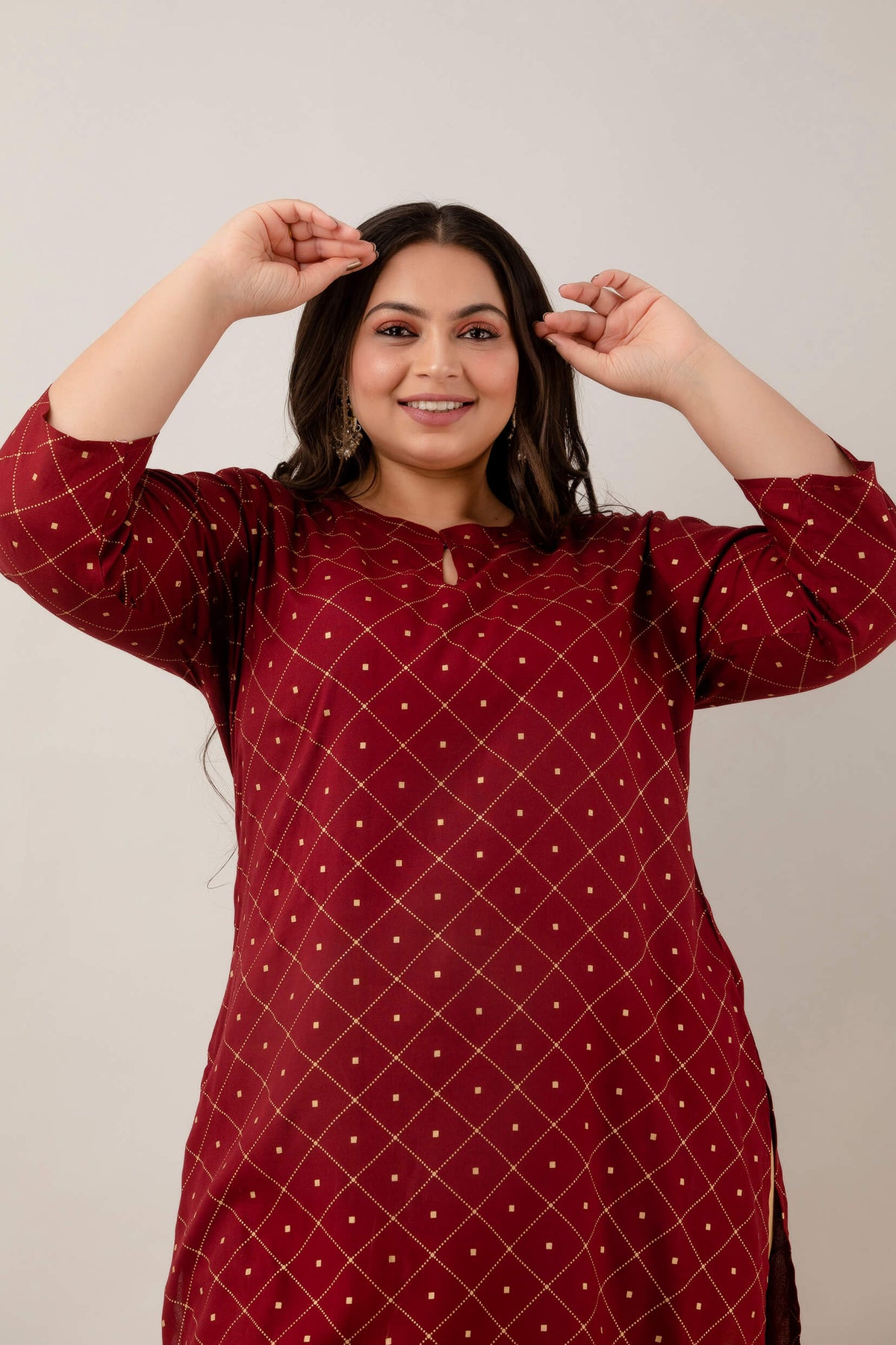 Mid closeup showing neckline and sleeves; smooth lightweight rayon; versatile ethnic essential in maroon.