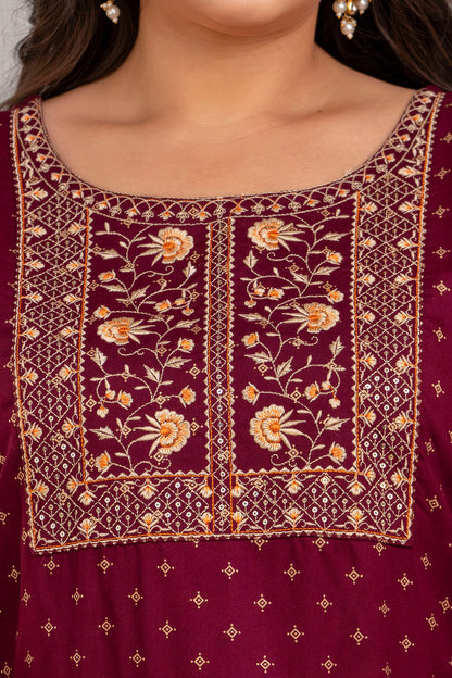 Close-up of floral embroidered yoke on maroon rayon kurti for full figure women