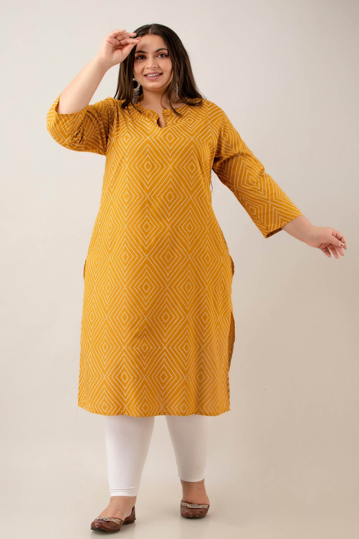 Full length kurti in mustard rayon with easy straight silhouette; comfortable drape and movement; polished daily wear basic.