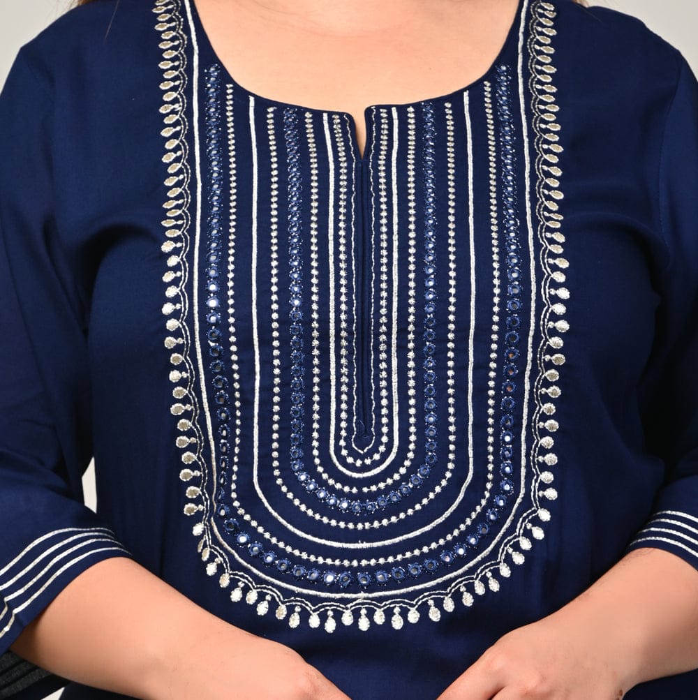 Close up of mirror work concentric yoke and notch neckline on navy rayon kurti for curvy women