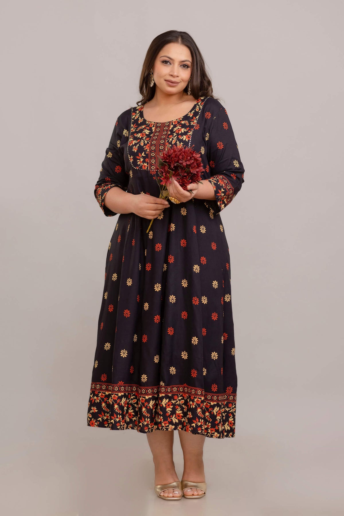 Curvy plus size fat woman wearing black printed rayon gown, stylish big size ethnic dress