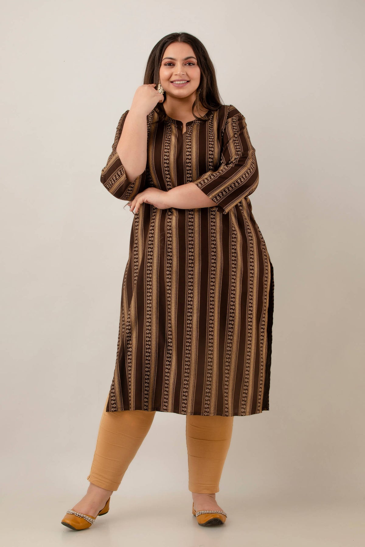 Front view coffee brown rayon kurti with notch neck and 3/4 sleeves; elongating stripe print; smart workwear look.