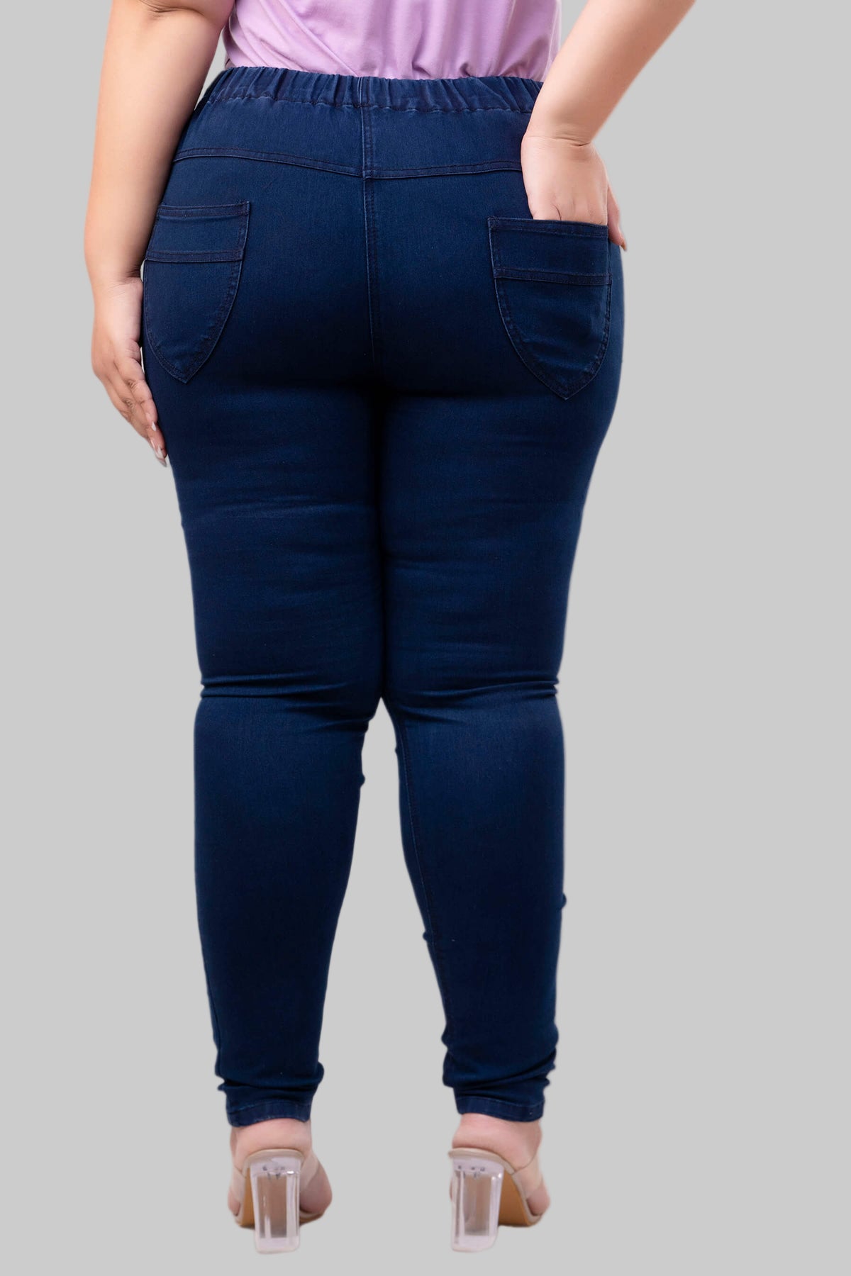 Back view of dark blue jeggings with functional pockets for plus size and fat women – Curvisha