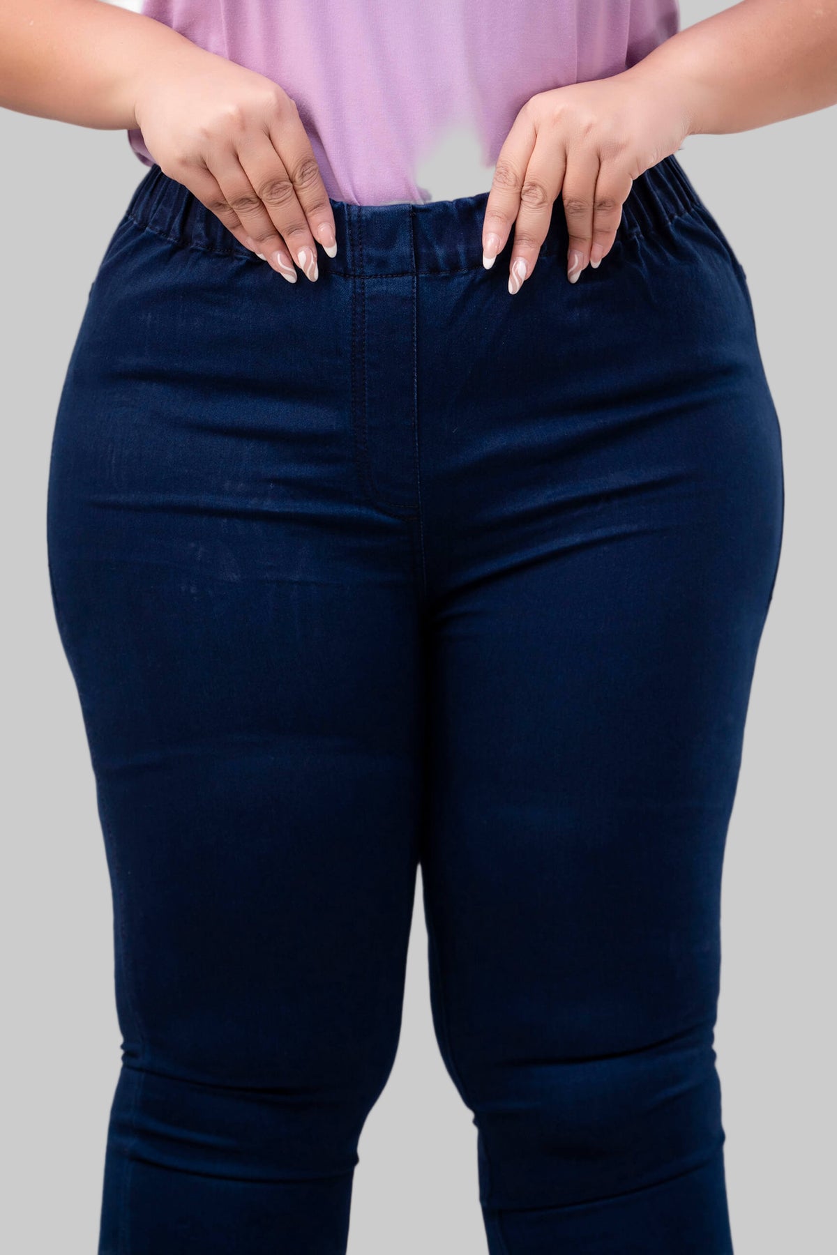 Waistband close-up of dark blue jeggings for curvy women showing soft stretch detail – Curvisha
