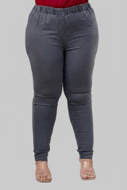 Front close view of grey stretch jeggings for curvy women with smooth waistband and skinny fit – Curvisha