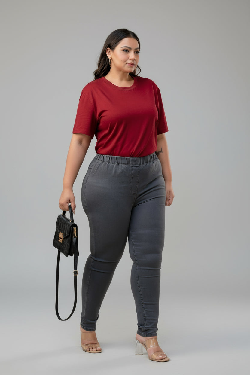 Full front view of plus size grey denim jeggings styled with red top and block heels for curvy women – Curvisha