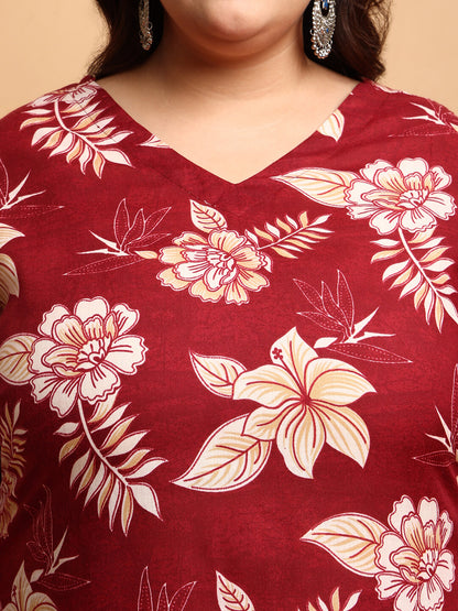Close-up of V-neck maroon cotton kurti with beige floral print and detailed stitching for full figure women – Curvisha