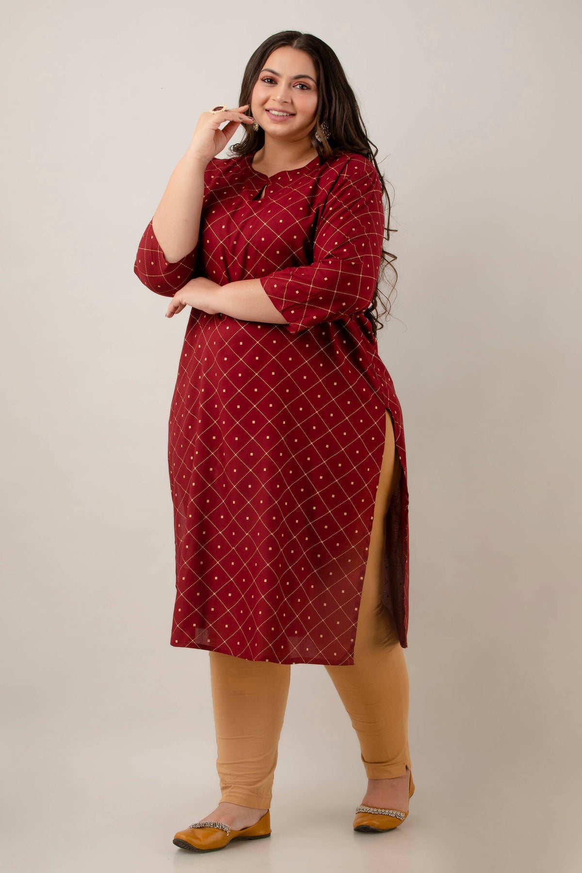 Styled look with beige leggings and juttis; maroon rayon kurti with diamond grid; confidence-boosting, fat-friendly outfit.