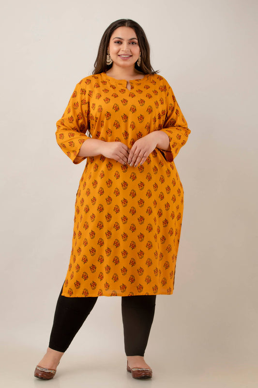 Front view mustard rayon kurti with notch neck and 3/4 sleeves; elegant floral buta; smart workwear pick for curvy shoppers.