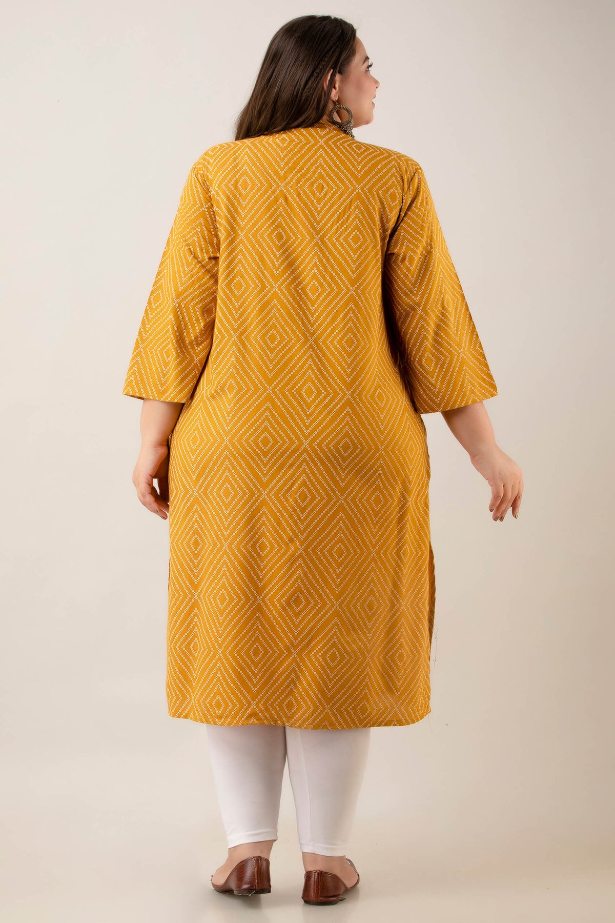 Back view of mustard rayon geometric-diamond kurti; breathable straight fit with side slits; flattering everyday style for plus-size and fat women.
