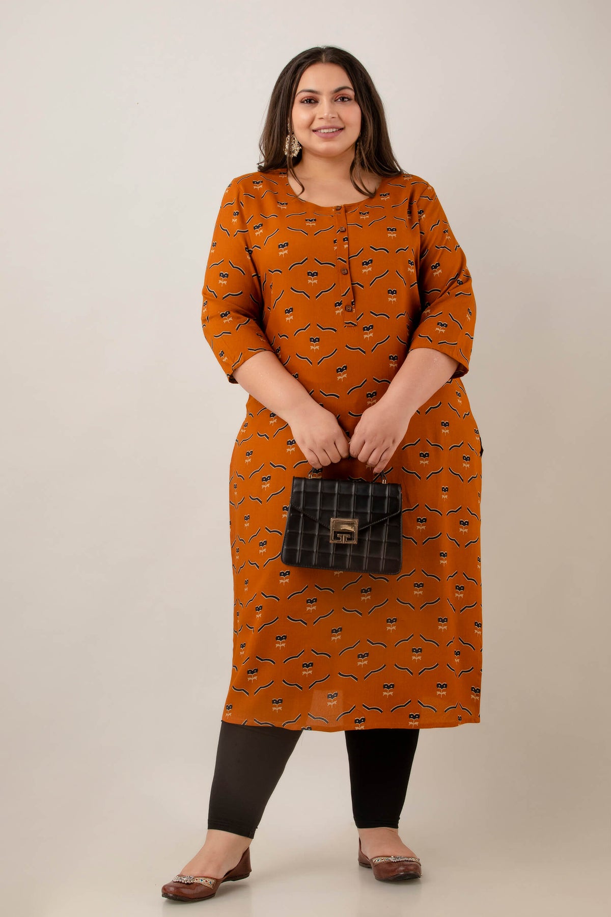 Side angle of mustard rayon kurti, straight fit with side slits, soft abstract print for curvy women, Plus Size 3XL–9XL