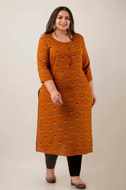 Walking shot of Plus Size abstract print rayon kurti on mustard base, office to casual look, fat-friendly drape, sizes 3XL–9XL