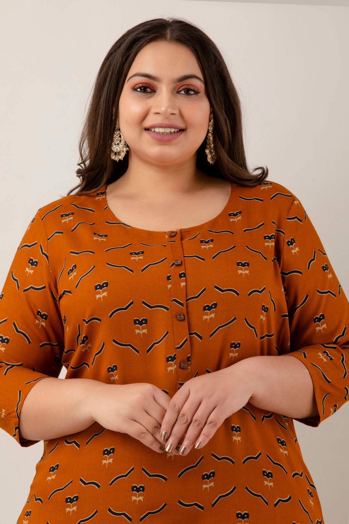 Fabric and abstract print closeup of mustard rayon kurti, lightweight soft rayon for big size clothing, 3XL–9XL