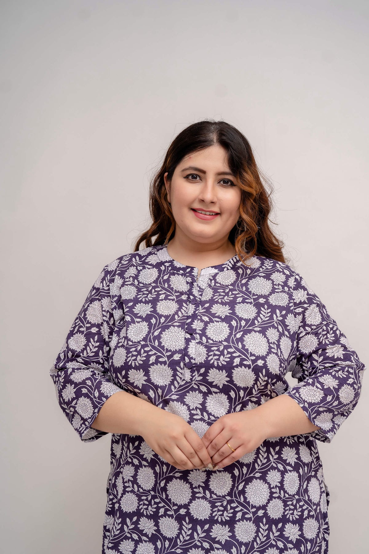 Closeup front of purple cotton kurti, notch neck and button placket, plus size outfit for full figure