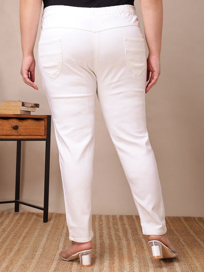 Back view of plus size white jeggings with curved patch pockets and sleek leg fit – Curvisha
