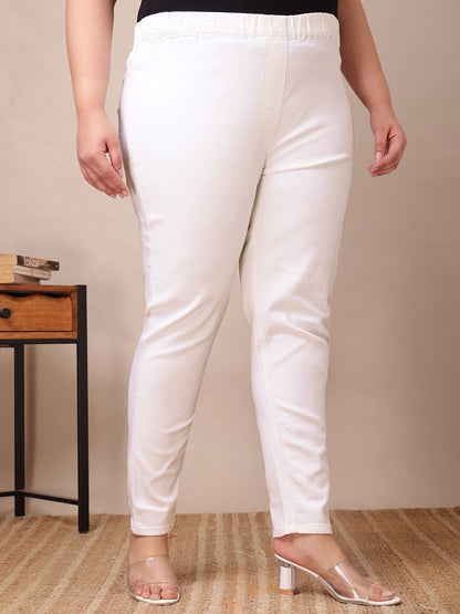 Three-quarter front view of white stretch jeggings with comfy waistband and ankle length fit – Curvisha