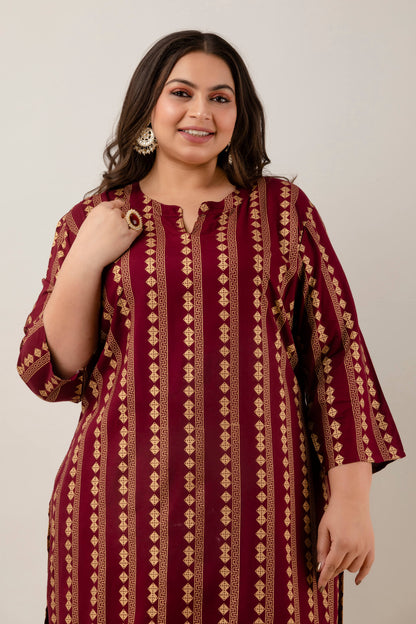 Fabric detail showing gold geometric vertical print on maroon rayon kurti for plus size outfits