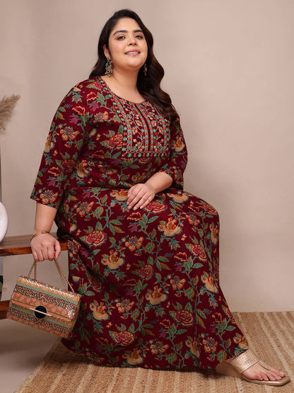 Maroon embroidered rayon gown dress seated view for fat plus size women