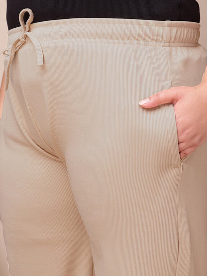 Zip pocket detail on beige ribbed wide-leg pants for curvy women, breathable stretch fabric – Curvisha