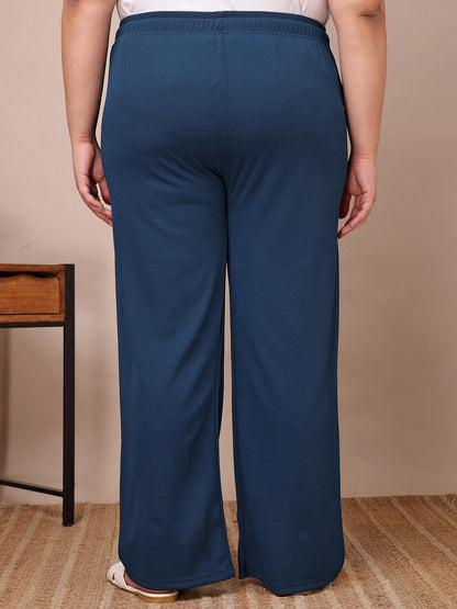 Back view of blue ribbed wide-leg lounge pants for curvy women, relaxed silhouette – Curvisha
