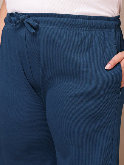 Pocket detail on blue ribbed wide-leg pants for plus size women, smooth stretch fabric – Curvisha