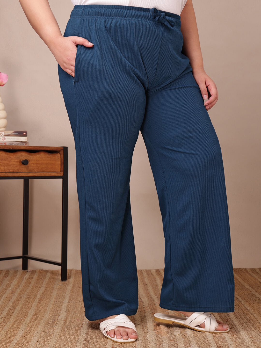 Side view of blue ribbed wide-leg pants for fat women clothing, breathable stretch knit – Curvisha