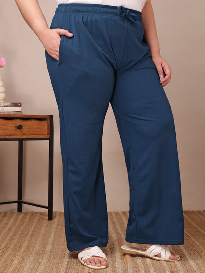 Side view of blue ribbed wide-leg pants for fat women clothing, breathable stretch knit – Curvisha