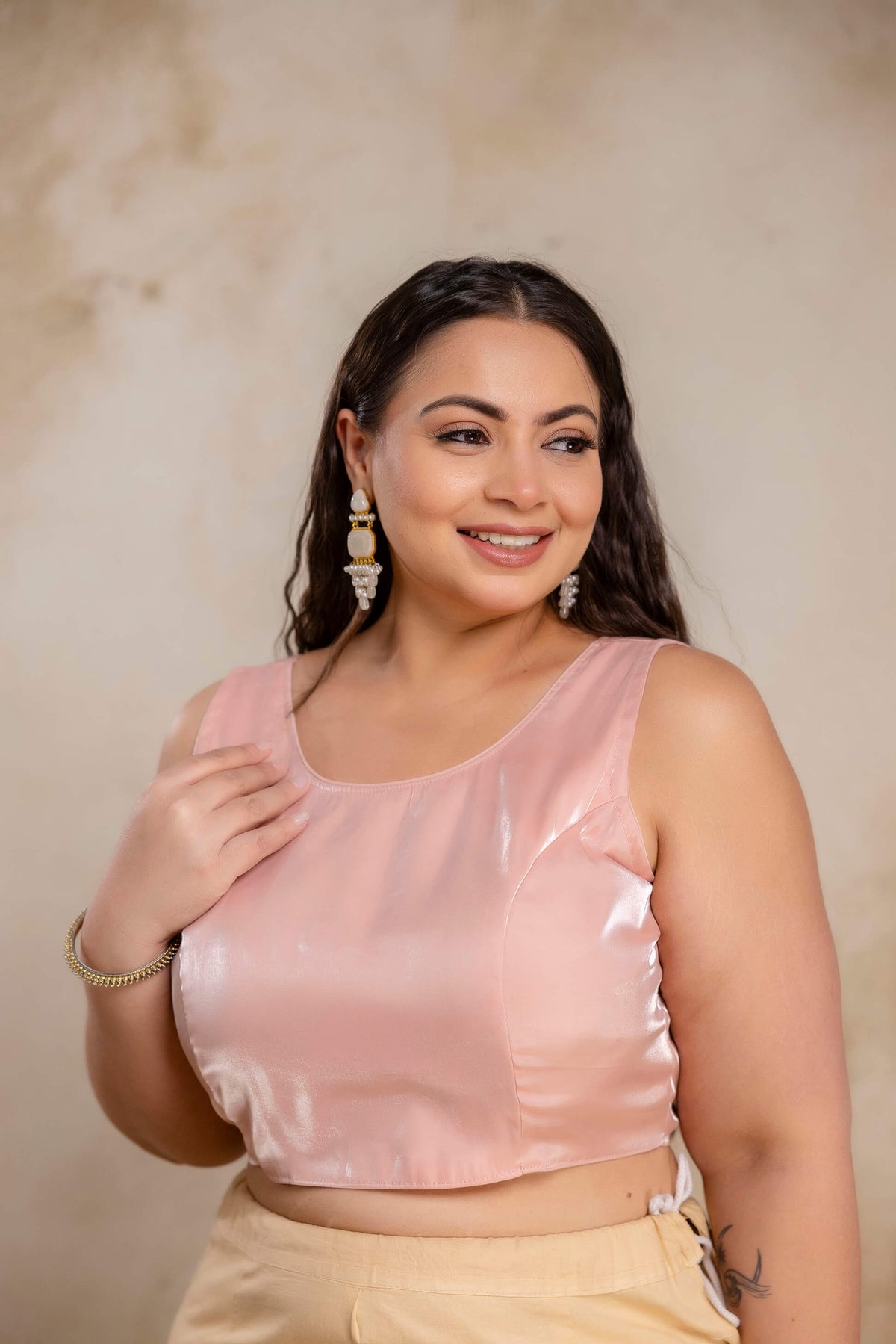Plus size blush pink Jimmy Choo blouse side view on fat women, flattering fit blouse for curvy full figure