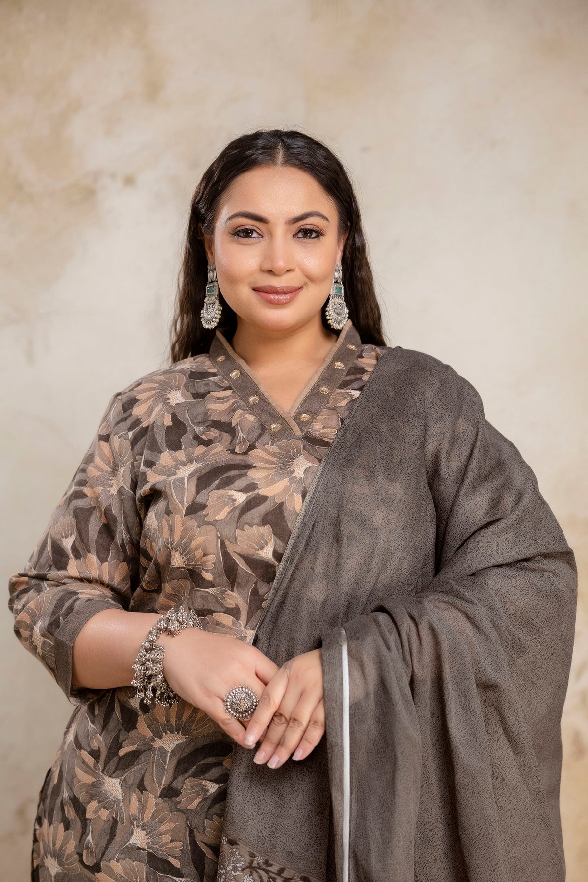 Close up floral print fabric on plus size brown kurti, big size clothing detail