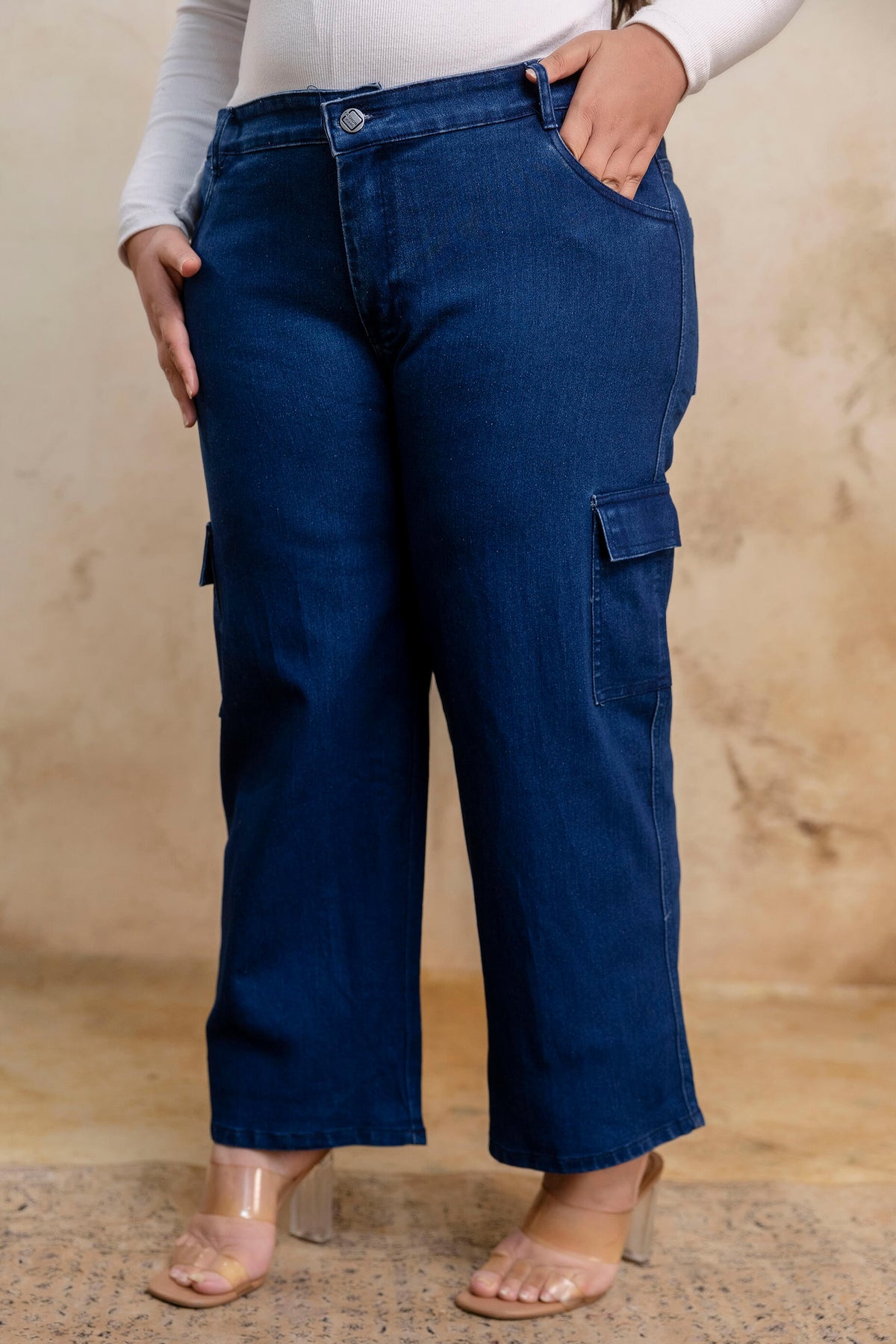 Plus size buttoned dark blue denim pants side view for fat women, wide leg big size clothing