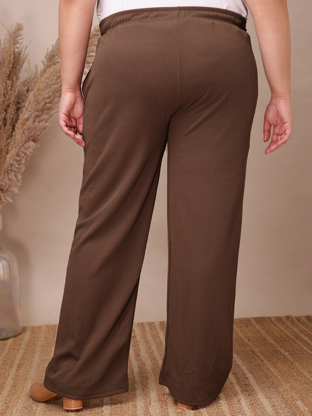 Back view of coffee brown ribbed wide-leg pants for curvy women, relaxed fall – Curvisha