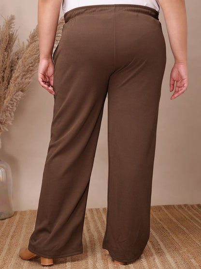 Back view of coffee brown ribbed wide-leg pants for curvy women, relaxed fall – Curvisha