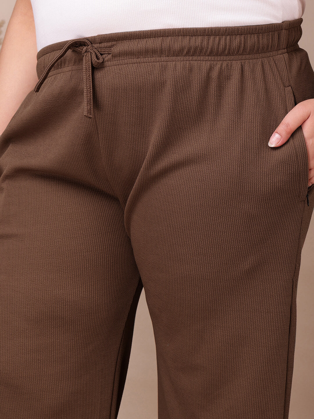 Pocket detail on coffee brown ribbed wide-leg pants for plus size women, breathable ribbed fabric – Curvisha