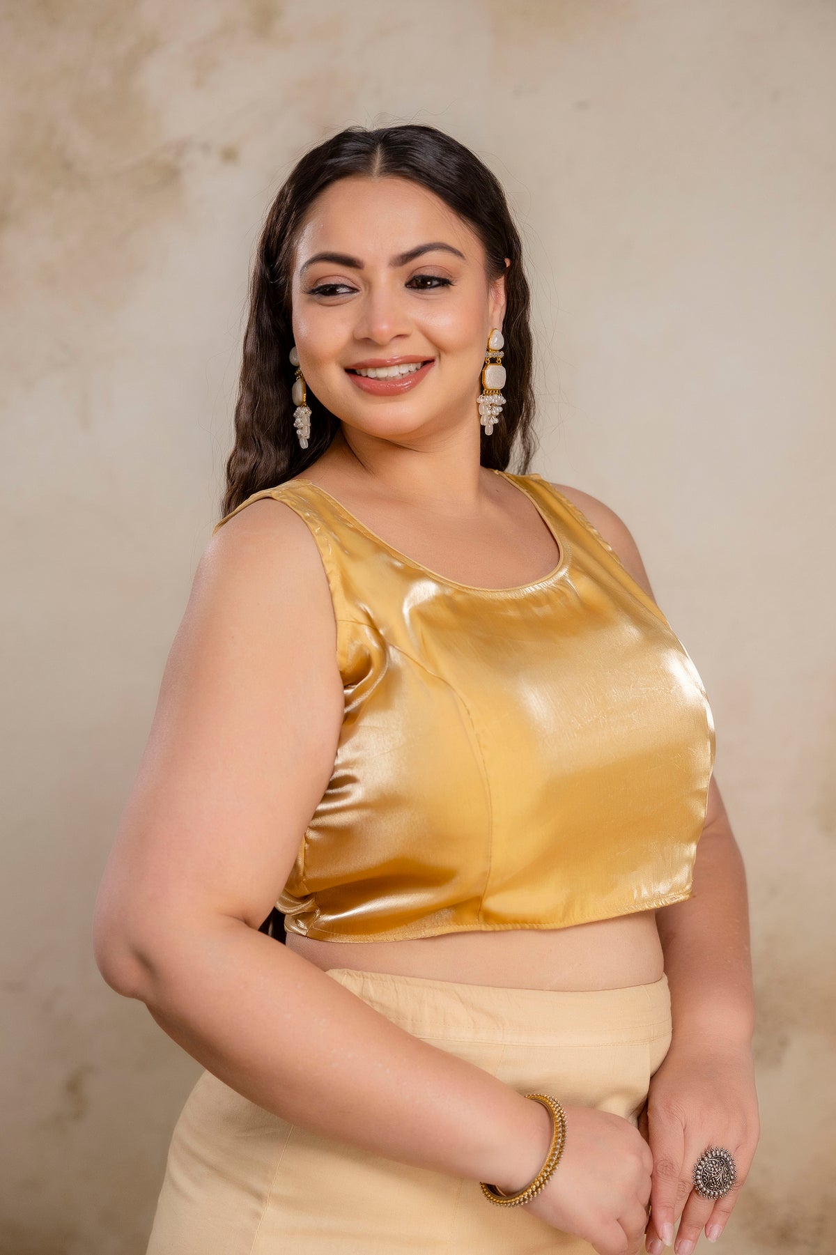 Plus size golden Jimmy Choo blouse side view on fat women, flattering fit blouse for curvy full figure