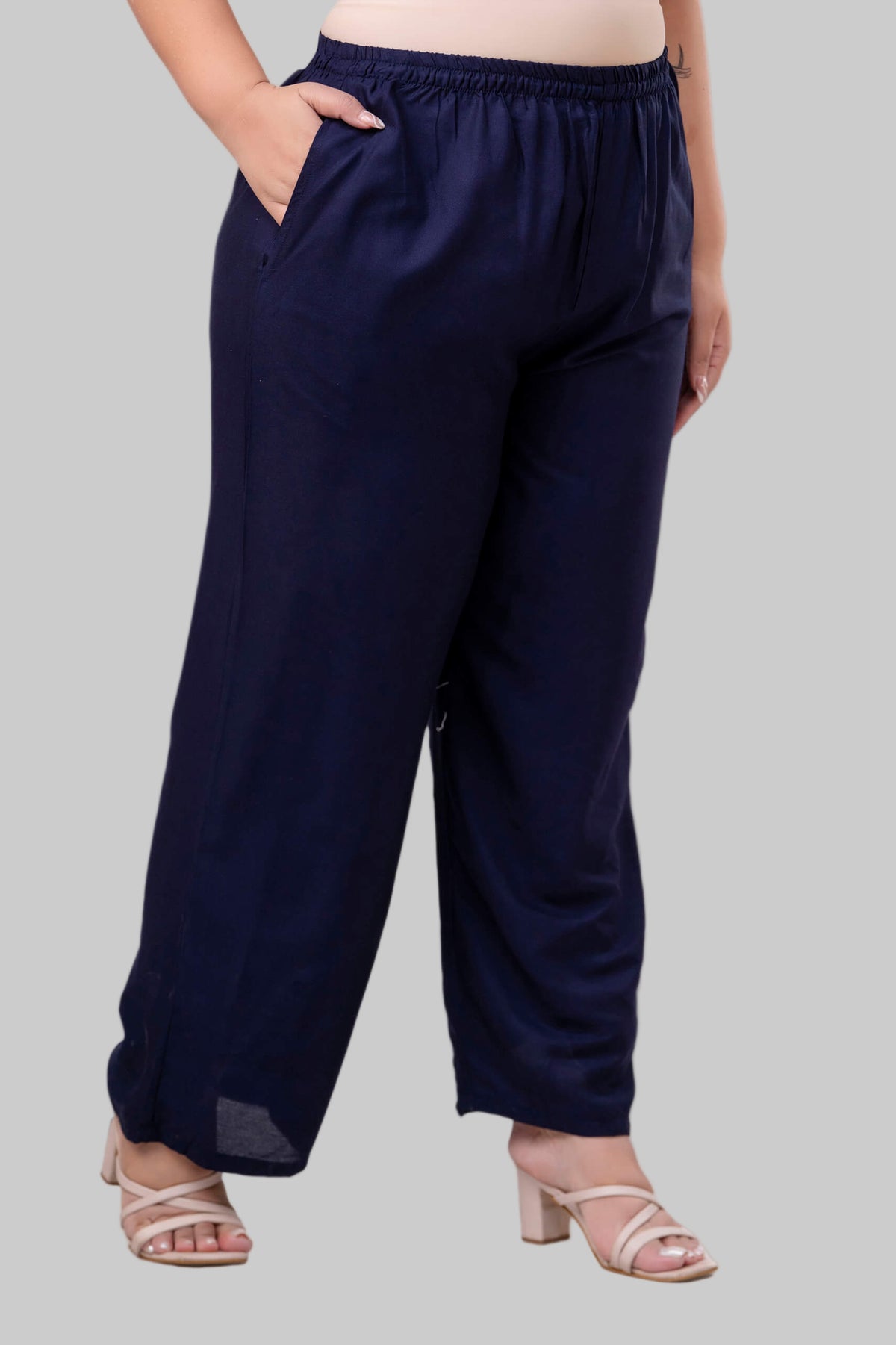 Side view of navy blue rayon palazzo for fat women clothing, comfy relaxed fit and side pockets – Curvisha