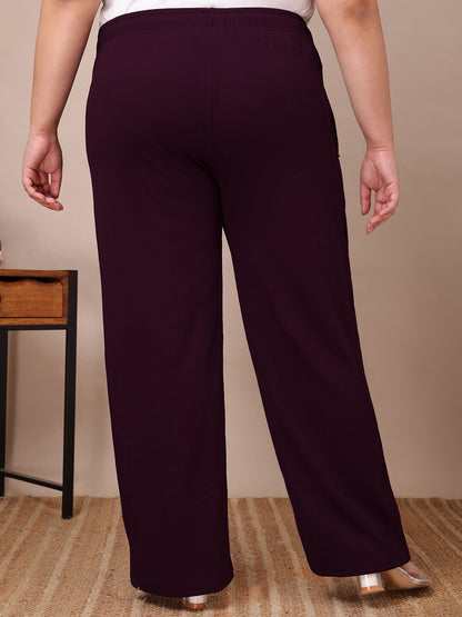 Back view of plum ribbed wide-leg pants for curvy women, relaxed fit and elegant drape – Curvisha