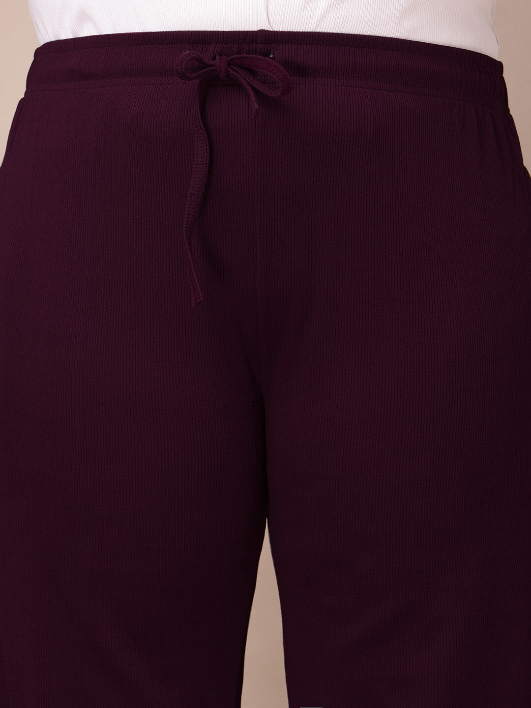 Close-up of drawstring waistband on plum ribbed pants for big size comfort and full figure fit – Curvisha