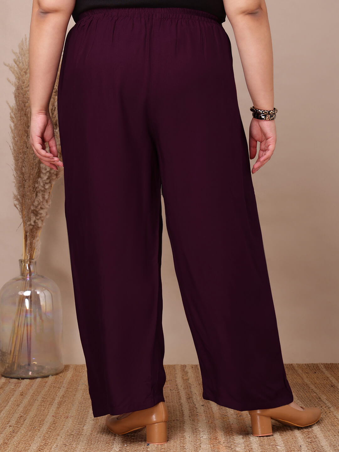 Back view of purple rayon palazzo pants for curvy women, relaxed wide-leg silhouette – Curvisha