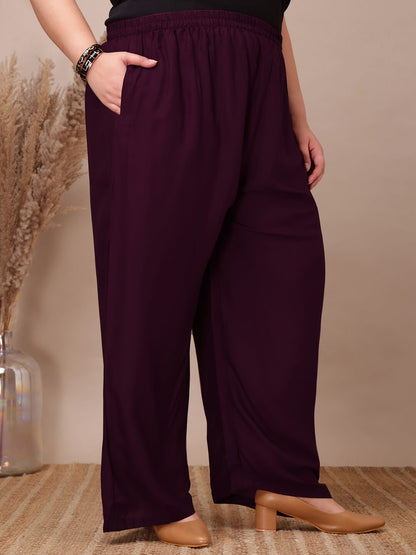 Front view of plus size purple rayon palazzo pants with elastic waistband and side pockets – Curvisha big size