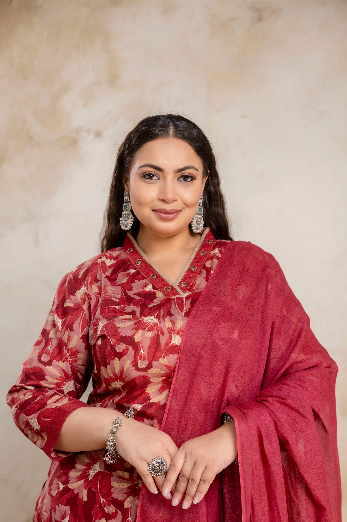Close up floral print detailing on plus size red kurti, big size clothing fabric