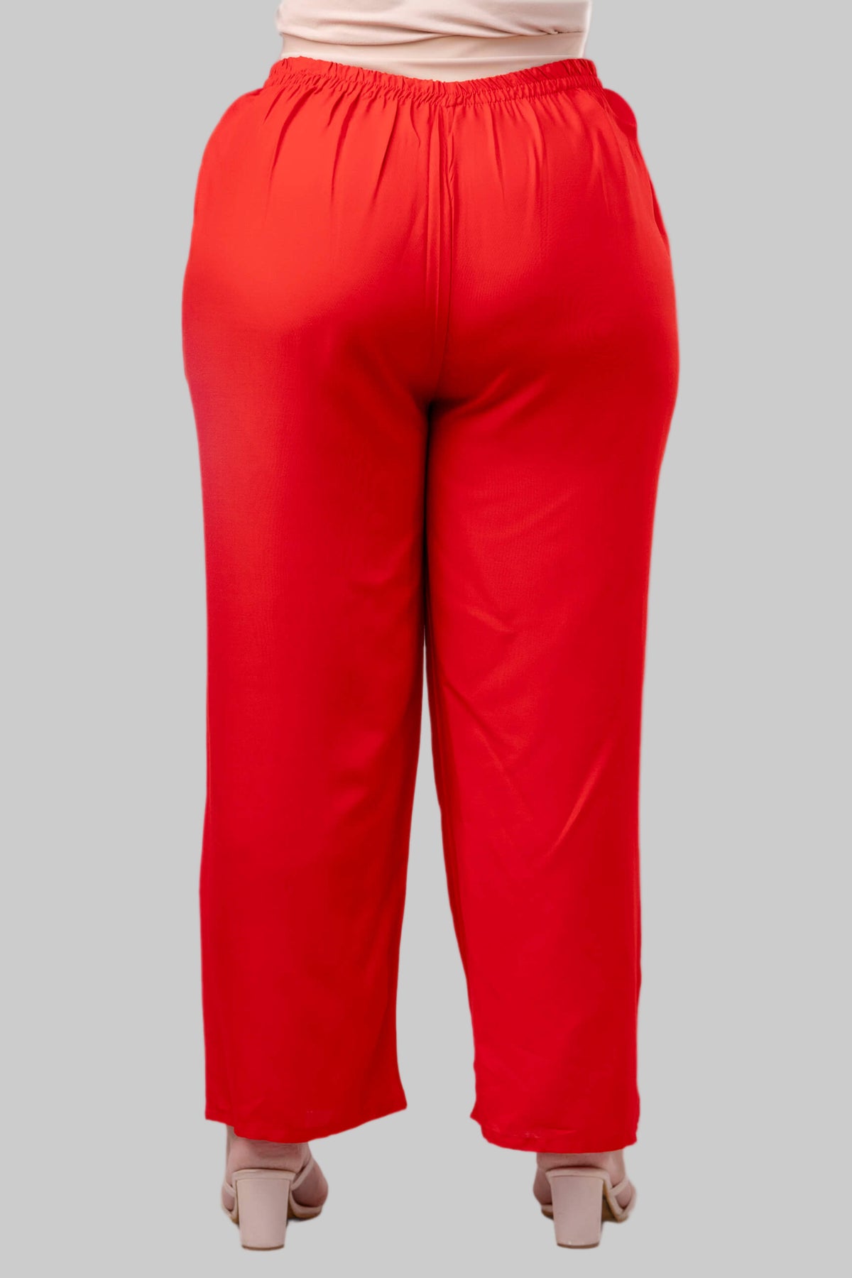 Back view of red rayon palazzo pants for curvy women, comfortable wide-leg design – Curvisha