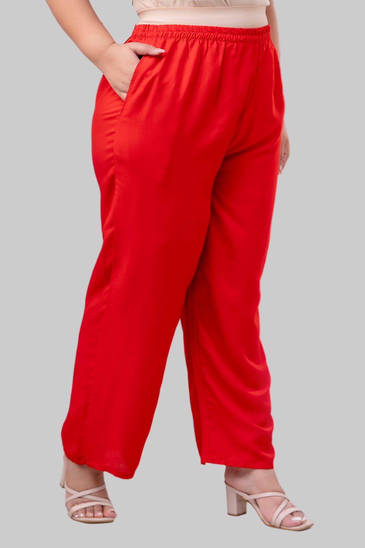 Side view of red rayon palazzo pants for fat women clothing, airy fit and flattering silhouette – Curvisha