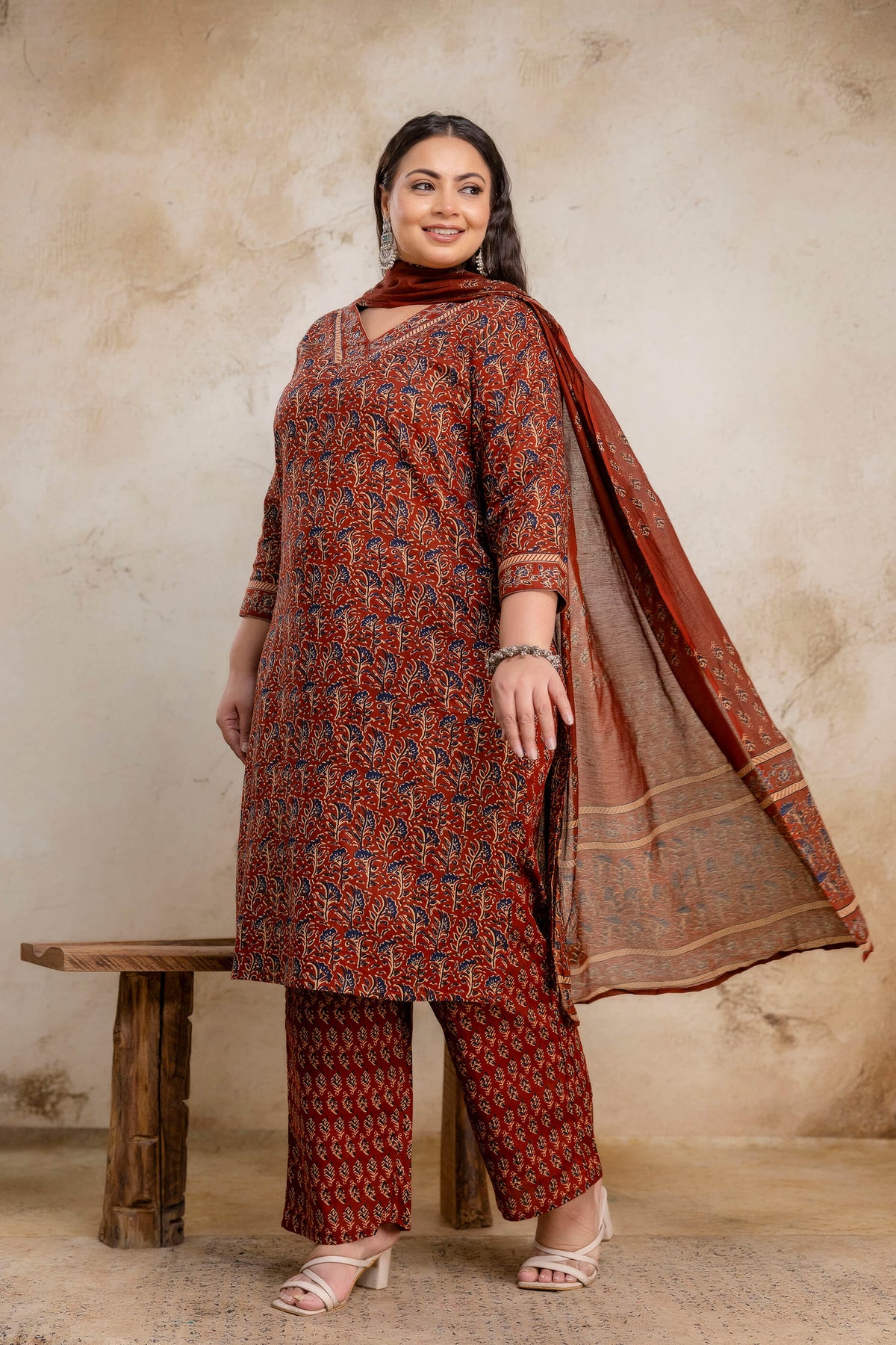 Side pose of plus size rust cotton kurti with dupatta for fat and curvy women, ethnic wear