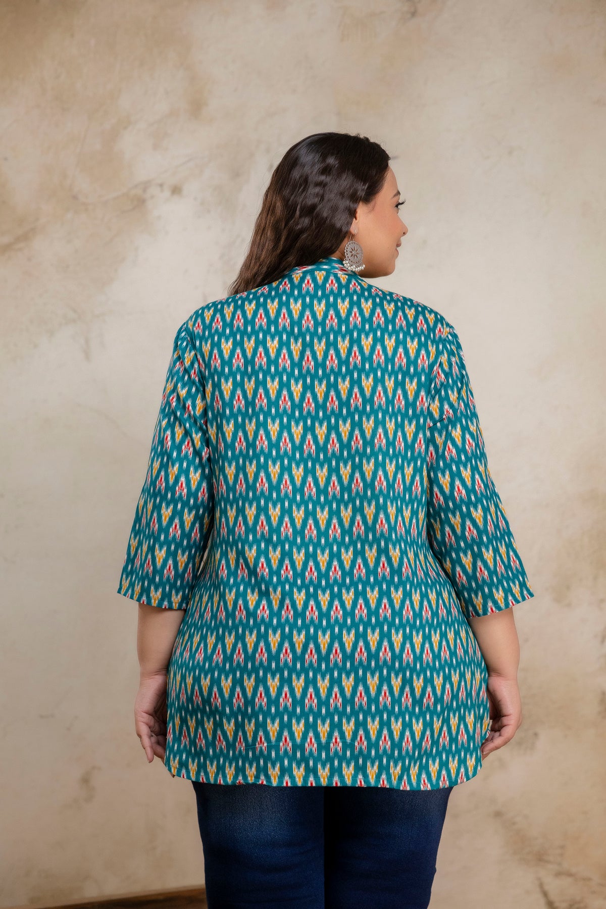 Back view of plus size teal green ikat cotton short kurti tunic