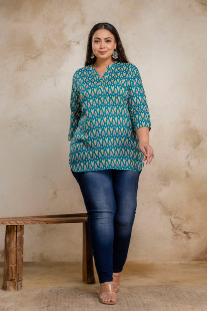 Full length plus size teal green ikat cotton short kurti styled with jeans